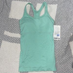 Lululemon Ebb to Street Tank size 4 NWT obo